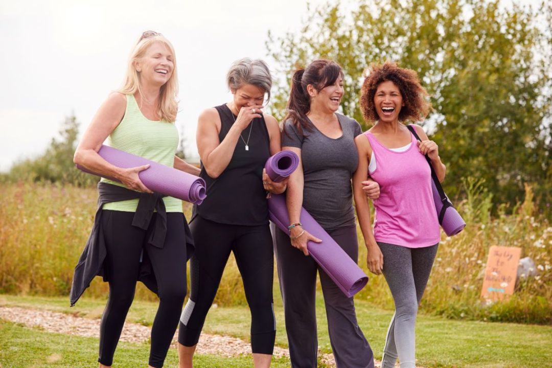 women walk to fitness class